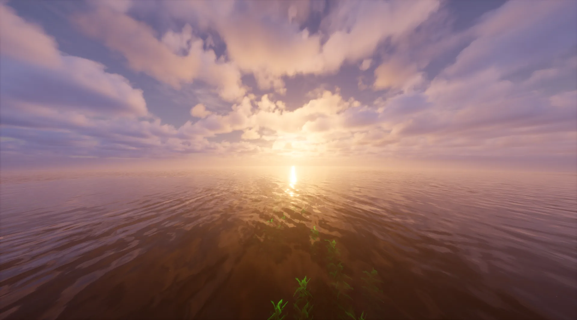 Amanecer sobre el océano con el sol reflejándose en el agua